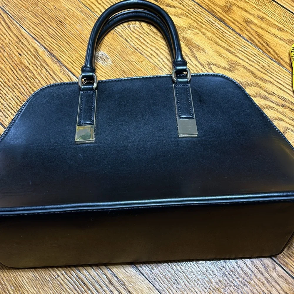 Aldo Faux leather handbag. Shoulder strap missing. Good condition. Black.